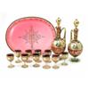 Image 1 : A Continental gilded and enamelled ruby glass liqueur set, consisting of two globe and shaft deca...