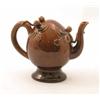 Image 1 : A Copeland & Garrett Cadogan teapot, glazed in brown monochrome and moulded with typical peach-bl...