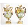 Image 1 : A pair of Copeland bone china 2-handled vases, each painted with a variety of flowers against a g...