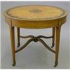 Image 1 : An Edwardian inlaid satinwood circular occasional table, with leaf and floral decorated top and b...