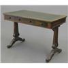 Image 1 : A Regency rosewood writing table, with green leather over two drawers fitted knob handles on end...