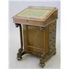 Image 1 : An early Victorian rosewood davenport, with real and dummy opposing drawers on scroll front suppo...