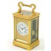 Image 1 : A French gilt-brass quarter-striking and repeating carriage clock, with enamelled dial, signed Fu...