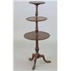 Image 1 : An Edwardian mahogany graduated 3-tier dumb waiter, with pie crust borders on spiral fluted knopp...