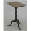 Image 1 : A George III mahogany tripod table, with rectangular tilt top on turned column, 1ft 9ins...