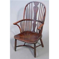 An early 19th century fruitwood hoop back Windsor chair, with elm seat and crinoline stretcher...