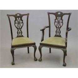 A set of eight Edwardian Chippendale design mahogany dining chairs, (including two with arms), wi...