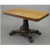 Image 1 : A late Regency breakfast table, with rectangular top on gun barrel stem and platform on four scro...