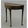Image 1 : A mid 18th century demi lune side table, with rising top on tapered legs with pad feet (adapted)...
