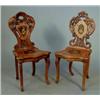 Image 1 : A late 19th century Swiss musical chair, with carved and inlaid back and inlaid splat and seat on...