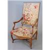 Image 1 : An early 20th century Louis XVI design walnut fauteuil, with floral tapestry seat and back on cab...