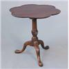 Image 1 : A Chippendale design mahogany circular occasional table, with lobed top on reeded stem and acanth...