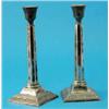 Image 1 : A pair of George VI silver candlesticks, with octagonal columns supported on beaded and foliate s...