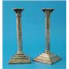 Image 1 : A pair of George V silver fluted corinthian column candlesticks, with loaded stepped square bases...