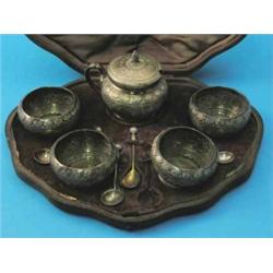 A cased Victorian condiment set, comprising drum mustard, four salts and four spoons, each decora...