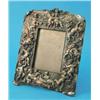 Image 1 : A Continental plated photograph frame, decorated throughout with Putti and floral motifs, 11ins...