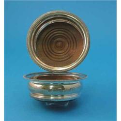A pair of silver wine coasters, with gadrooned rims, maker P & S, London 1961...