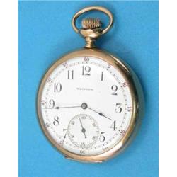 A 14k gold Waltham keyless pocket watch with monogrammed case and enamelled Arabic dial with subs...