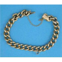 A 15ct gold curb link bracelet, 21.7grms...