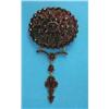 Image 1 : A Victorian garnet set brooch, with attached articulated drop set further garnets...