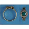 Image 1 : An 18ct gold, emerald and diamond cluster ring, with carved scrolled shoulders...