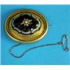 Image 1 : A Victorian bloomed gold carved agate oval brooch, gypsy-set with a split pearl, locket back...