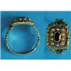 Image 1 : A Regency 18ct gold ring, set with an amethyst in a border of pearls within chased borders and sh...