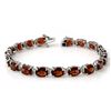 Image 1 : 28.0 CTW Garnet Bracelet 10K White Gold - REF-70M2F - 14117