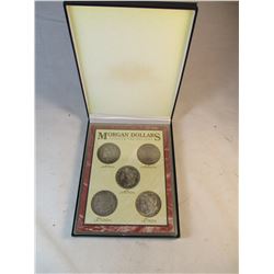 Set of Morgan Dollars in Case 1873, 1889, 1891, 1900, 1921