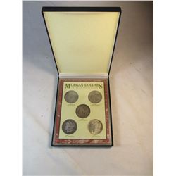 Set of Morgan Dollars in Case 1879, 1891, 1889, 1900, 1921
