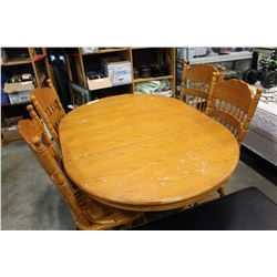 ROUND OAK TABLE AND FOUR PRESSBACK CHAIRS