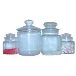 Glass candy jars (4): round one has c...