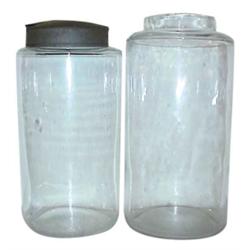 Round glass candy jars (2), 1 w/metal...