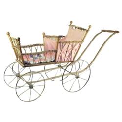 Child's wicker doll buggy w/metal whe...