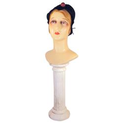Lady mannequin head on chalkware pill...