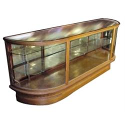 Curved floor display case, oak & glas...