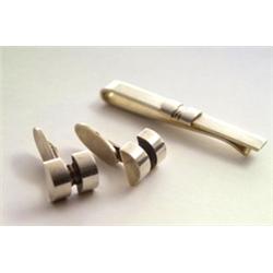 GEORG JENSEN, Kopenhagen - Krawattenklemme und Paar Manschettenknöpfe, - Silber. Stilisiertes,...