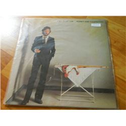 VINYL RECORD - ERIC CLAPTON - MONEY AND CIGARETTES - 92 37731 - DUCK RECORDS - condition - good