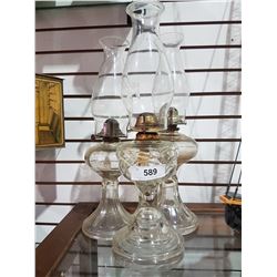 THREE GLASS OIL LAMPS