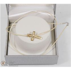 16) 10KT GOLD CROSS PENDANT ON HIGH FASHION CORD