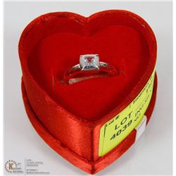 39) STERLING SILVER GENUINE BLUE TOPAZ RING