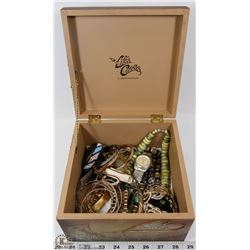 BROWN DECORATIVE STORAGE BOX FULL OF