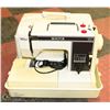 Image 1 : WHITE SEWING MACHINE IN CASE