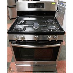GE GAS TOP CONVECTION RANGE WITH CENTER GRIDDLE.