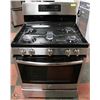 Image 1 : GE GAS TOP CONVECTION RANGE WITH CENTER GRIDDLE.
