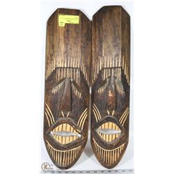 SET OF 2 HAND CARVED AFRICAN MASKS.