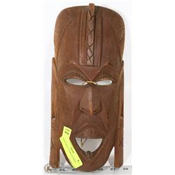 HAND CARVED AFRICAN MASK.