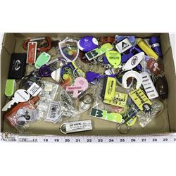 FLAT OF NEW KEYCHAINS.