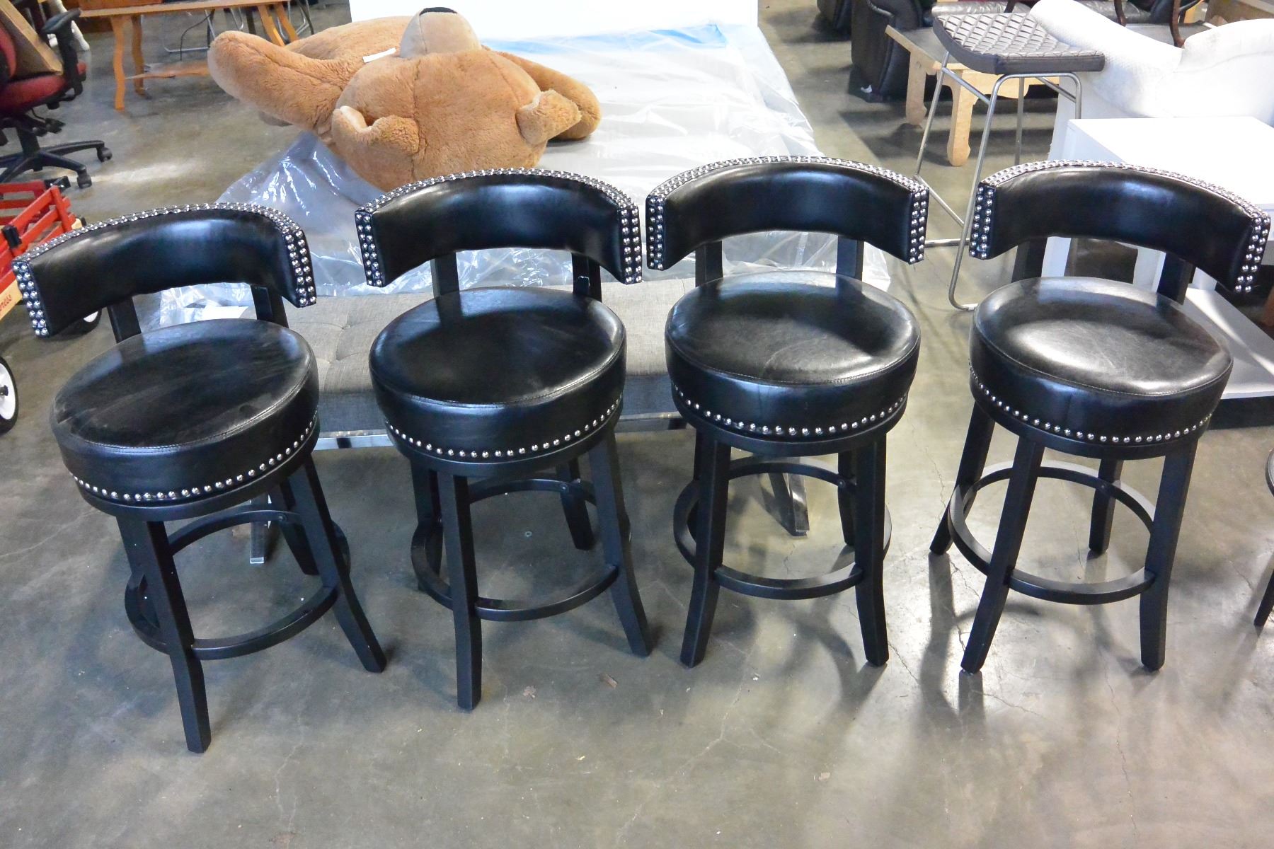 SET OF FOUR NEW BLACK STUDDED LEATHER SWIVEL BAR STOOLS SET OF FOUR NEW BLACK STUDDED LEATHER SWIVEL BAR STOOLS