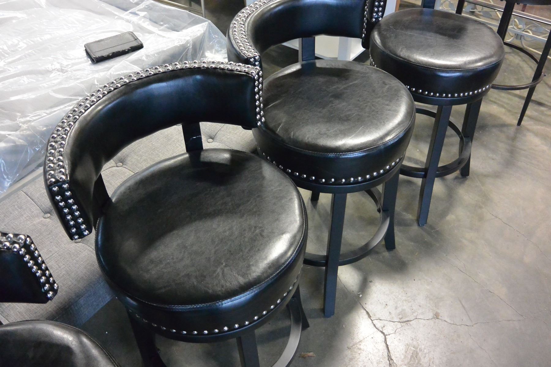 SET OF FOUR NEW BLACK STUDDED LEATHER SWIVEL BAR STOOLS SET OF FOUR NEW BLACK STUDDED LEATHER SWIVEL BAR STOOLS